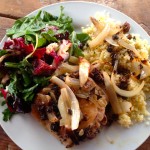 Roasted chicken thighs with couscous and salad